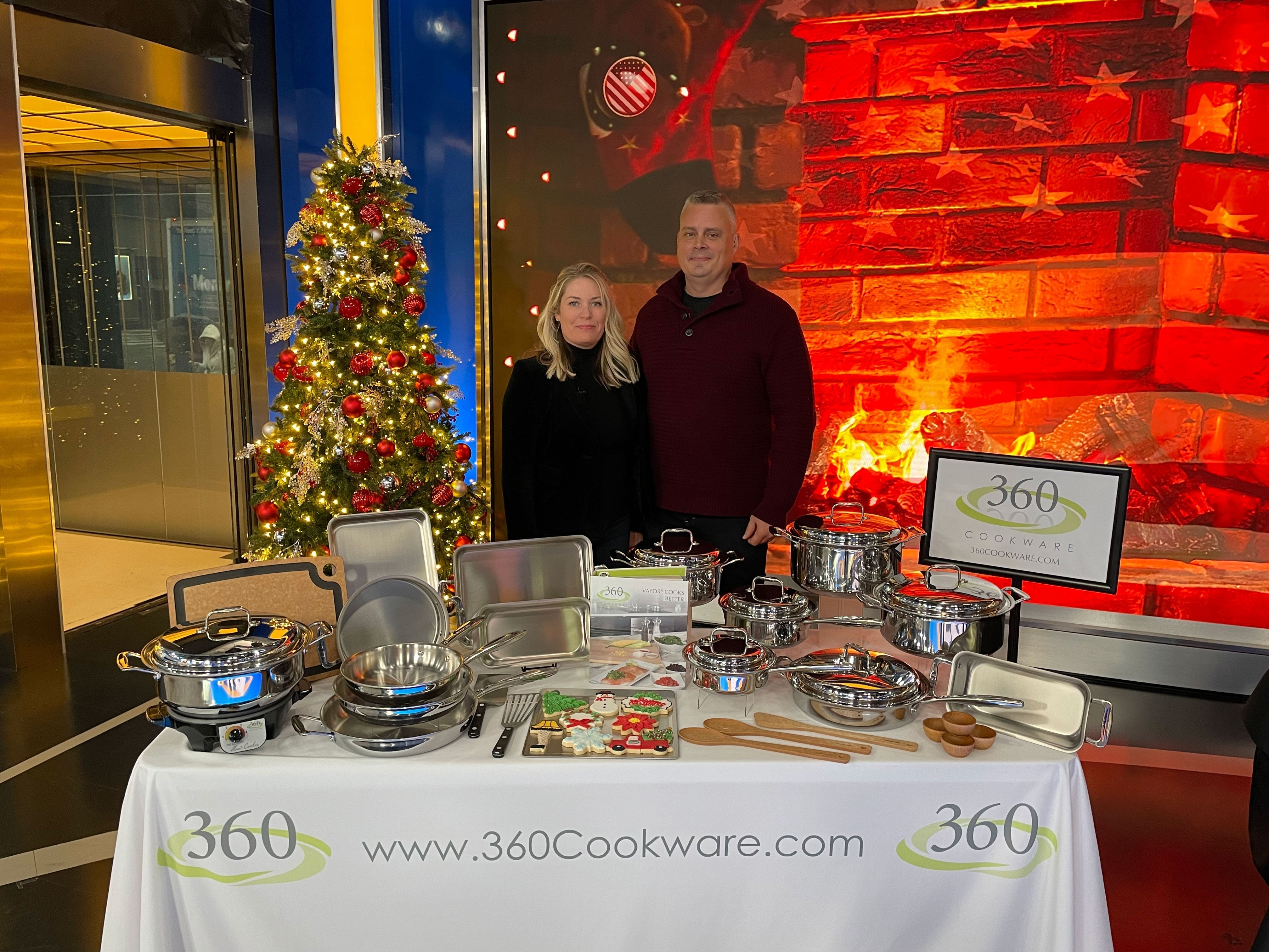 A display of 360cookware products with a Christmas tree in the background at Fox and Friends studio.