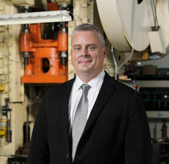 Bryan Hurley in the manufacturing facility, representing the launch of 360cookware in 2008.