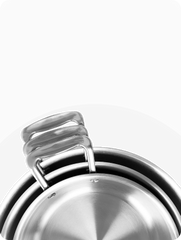 Close-up of cookware showcasing ergonomic handle and vapor seal technology