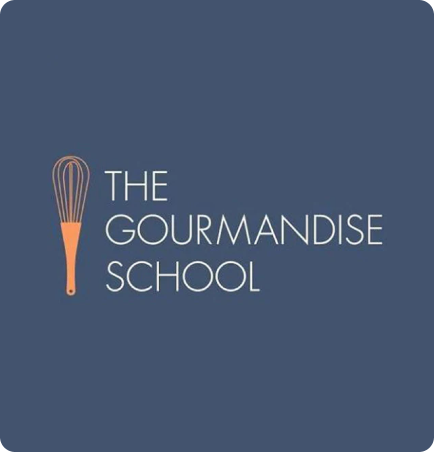 The Gourmandise Cooking School logo featuring a whisk