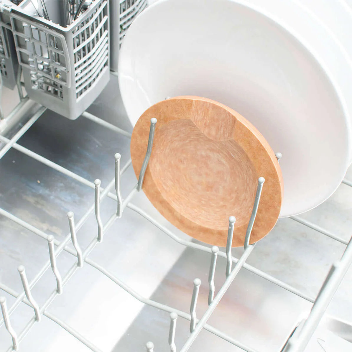 Natural round tool rest in dishwasher, showcasing its dishwasher-safe feature.