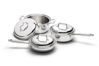 Three pieces of stainless steel cookware including a pot and two pans with lids.