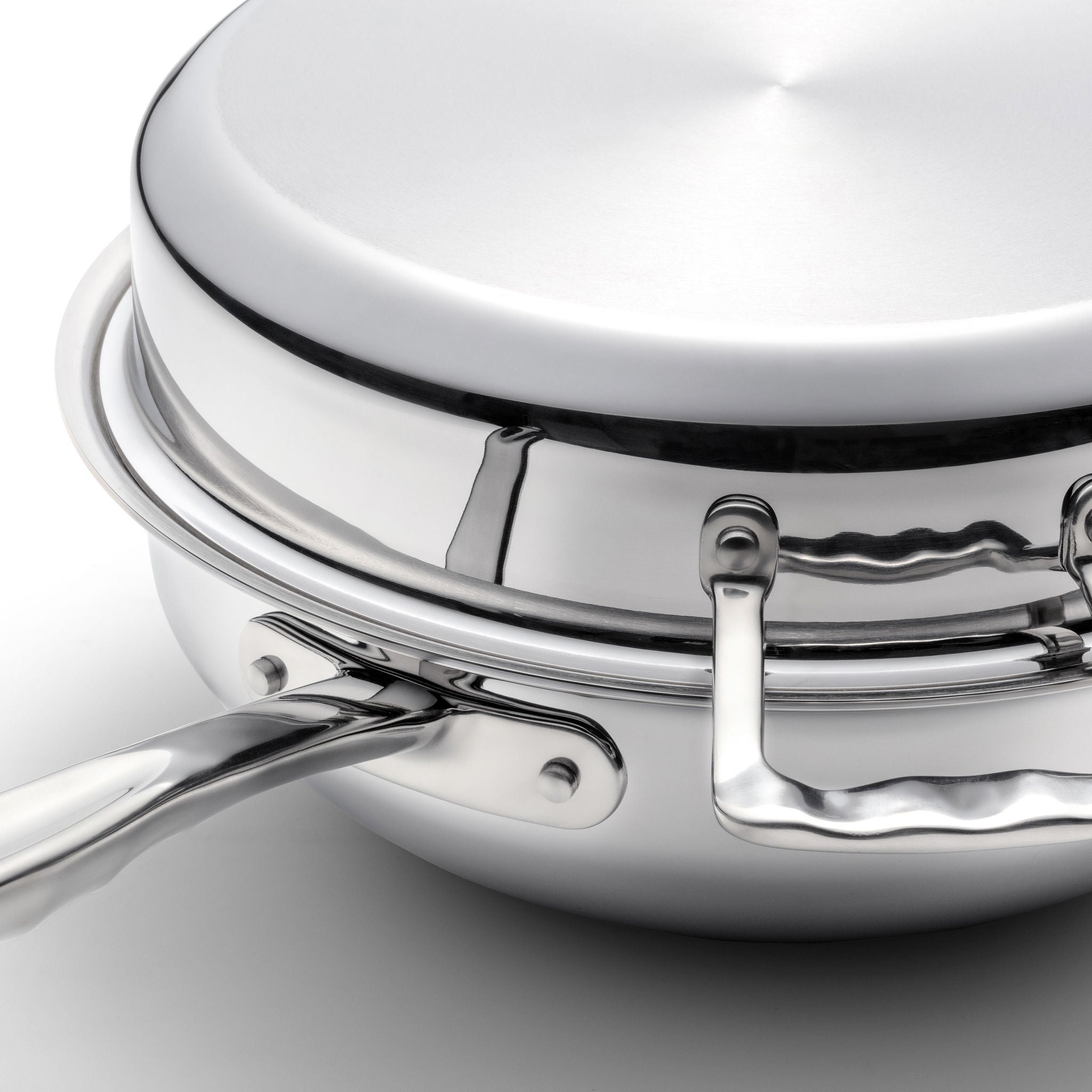 3-in-1 stainless steel roasting pan with a lid and handle