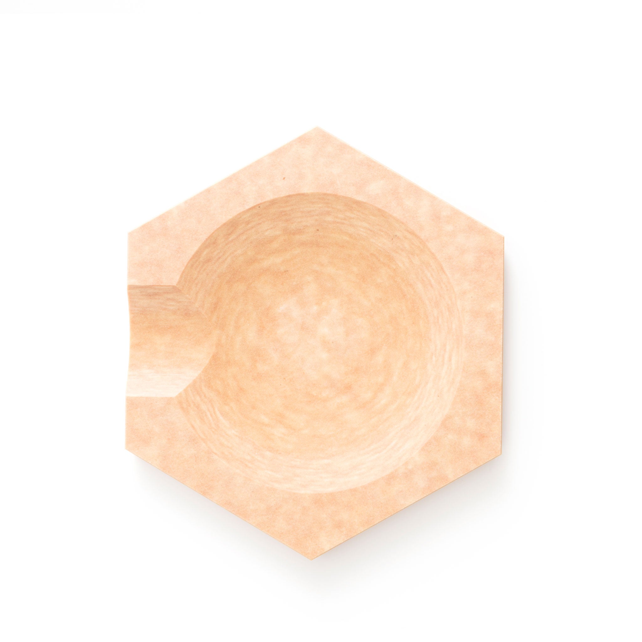 Natural hex tool rest for stylish countertop protection and cleanup.
